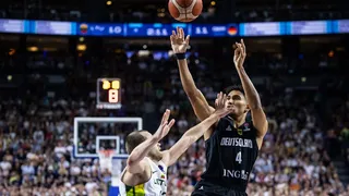 Dos triples de Lo sellan la victoria alemana tras dos prórrogas ante Lituania